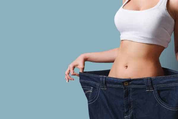 woman after fat reduction treatment Canary Wharf
